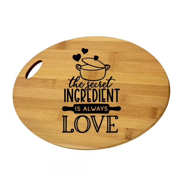 Engraved Oval Cutting Board - The Secret Ingredient Is Always Love
